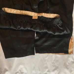 Black satin pyjama pants.